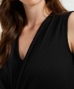 WE Fashion Dames Jumpsuit Met Knoopdetail En Structuur 15 WE Fashion Dames Jumpsuit Met Knoopdetail En Structuur -Exporteren dameskleding winkel 550x825 219